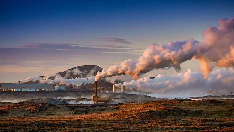 Geothermal machinery bellowing out steam 