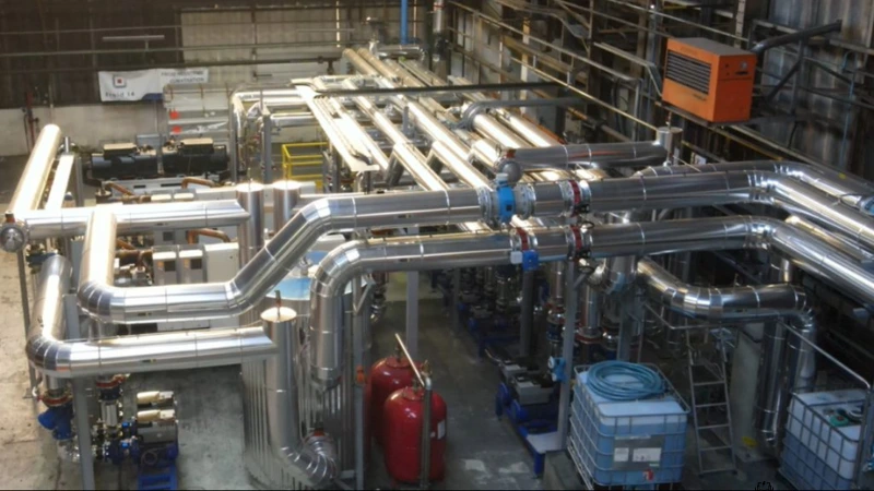 An industrial facility showing pipes transporting energy