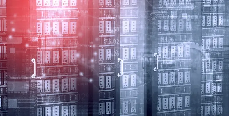 Image featuring a data centre with rows of server racks