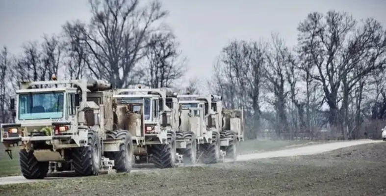 vibroseis_vehicles_operating_on_paved roads